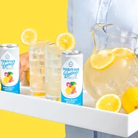 Healthy agave lemonade with vegetable infusion in a glass. Healthy agave lemonade with vegetable infusion in a glass.