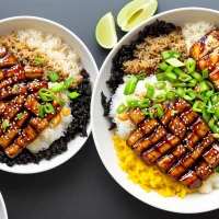 Delicious teriyaki bowl filled with savory meats and vegetables. Delicious teriyaki bowl filled with savory meats and vegetables.