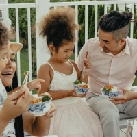 Smashed broccoli with parmesan on white plate. Smashed broccoli with parmesan on white plate.