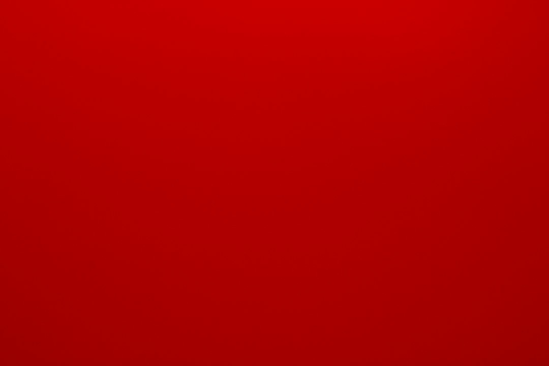 Stylish hiking boots with red laces on rocky terrain