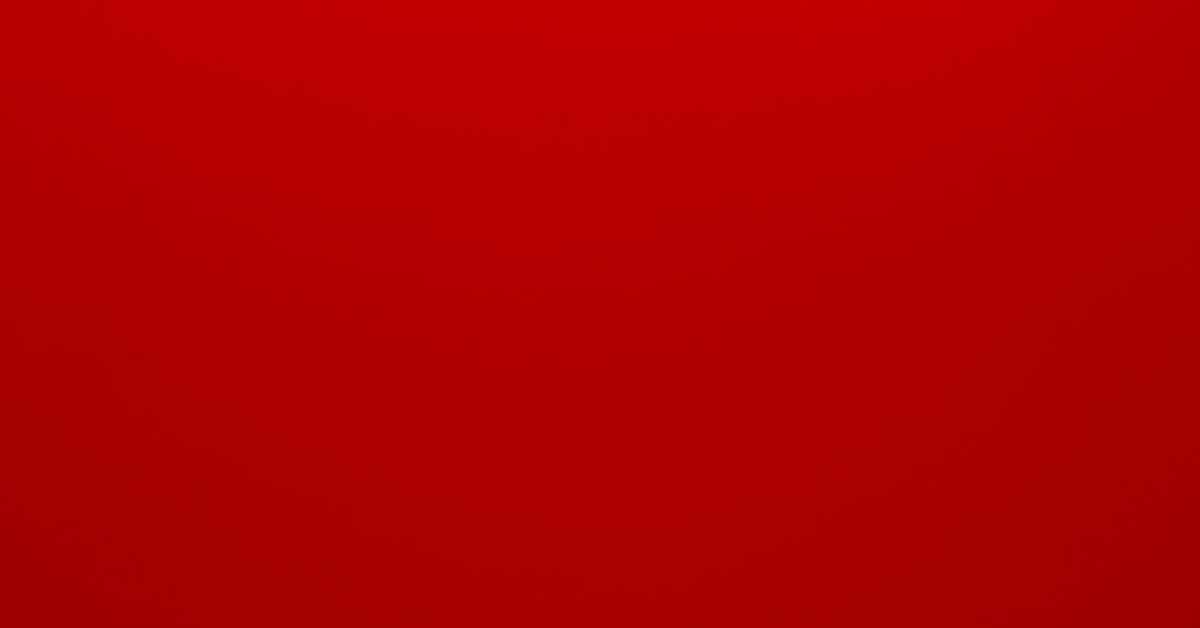 Stylish hiking boots with red laces on rocky terrain