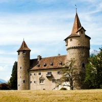 Disney Castle illuminated at night for 25th anniversary celebration. Disney Castle illuminated at night for 25th anniversary celebration.