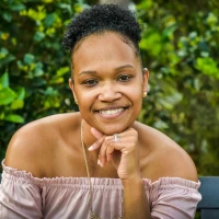 Elizabeth Flair smiling post-fame in candid portrait Elizabeth Flair smiling post-fame in candid portrait