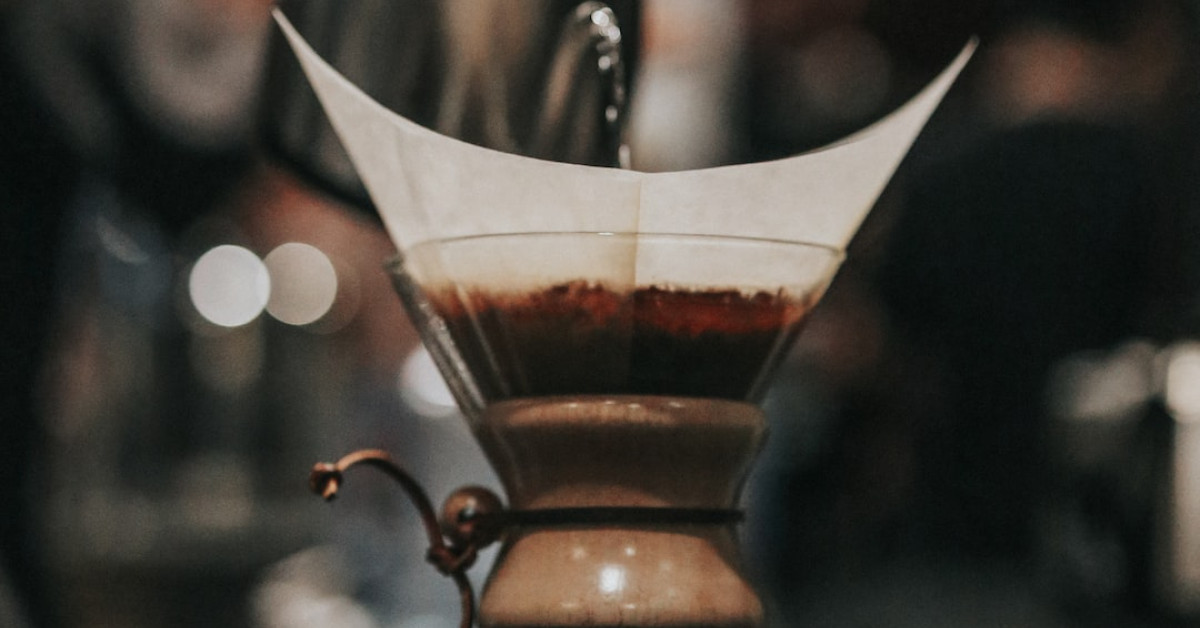 Farberware coffee maker with expert brewing guide on side.