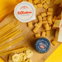 Whipped ricotta topping on colorful vegetable dish. Whipped ricotta topping on colorful vegetable dish.