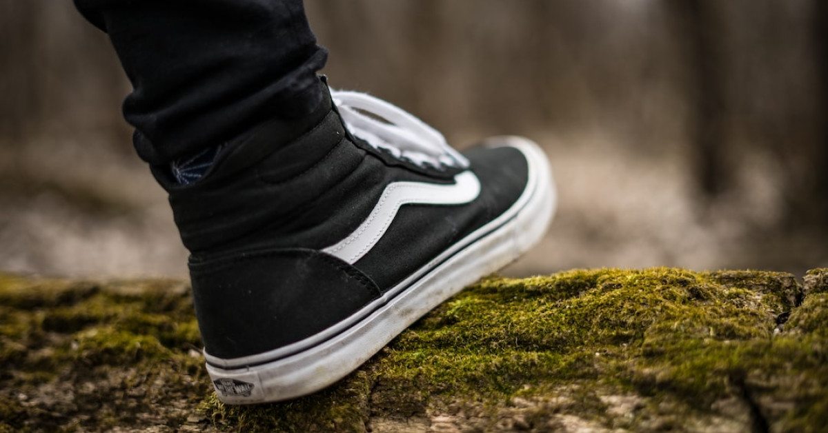 Trekking shoes on rocky trail amidst nature