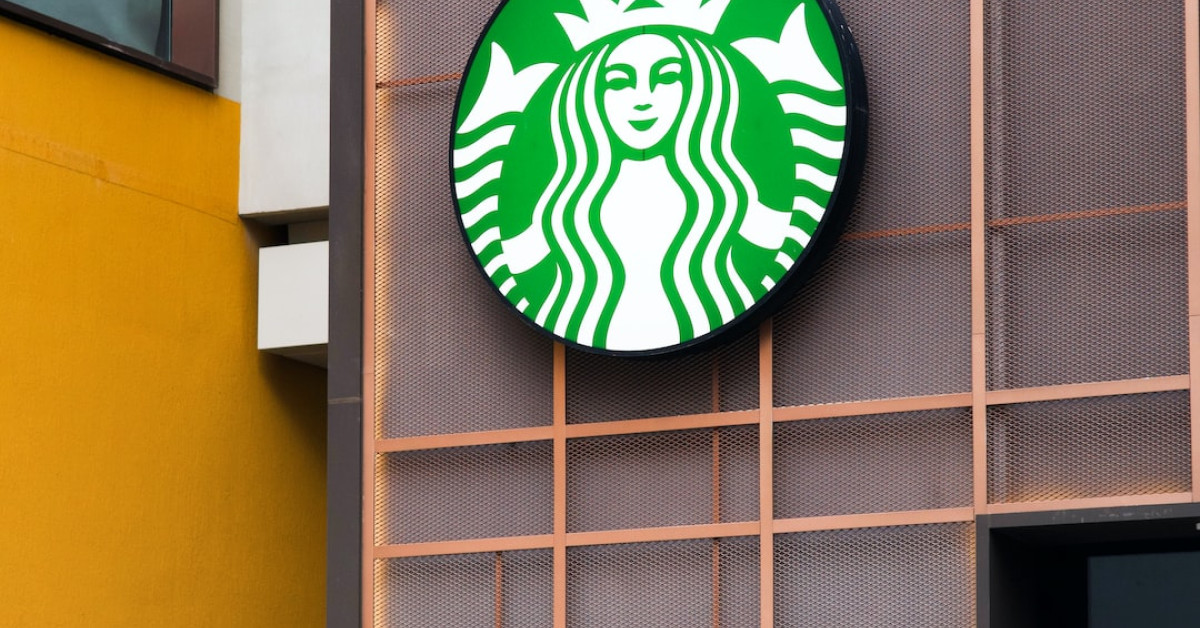 Personalized Starbucks cups showcasing unique coffee preferences.