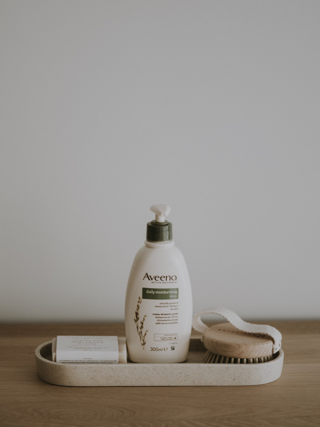 Ed Hardy tanning lotion with golden glow benefits highlighted.