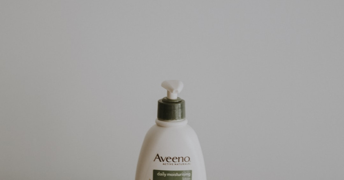 Ed Hardy tanning lotion with golden glow benefits highlighted.