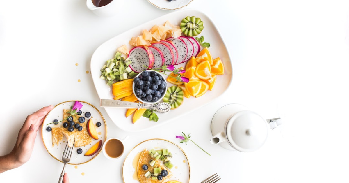 Person cycling for health benefits and wellbeing.