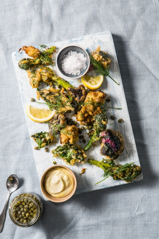 Fresh broccoli on cutting board promoting healthy eating.