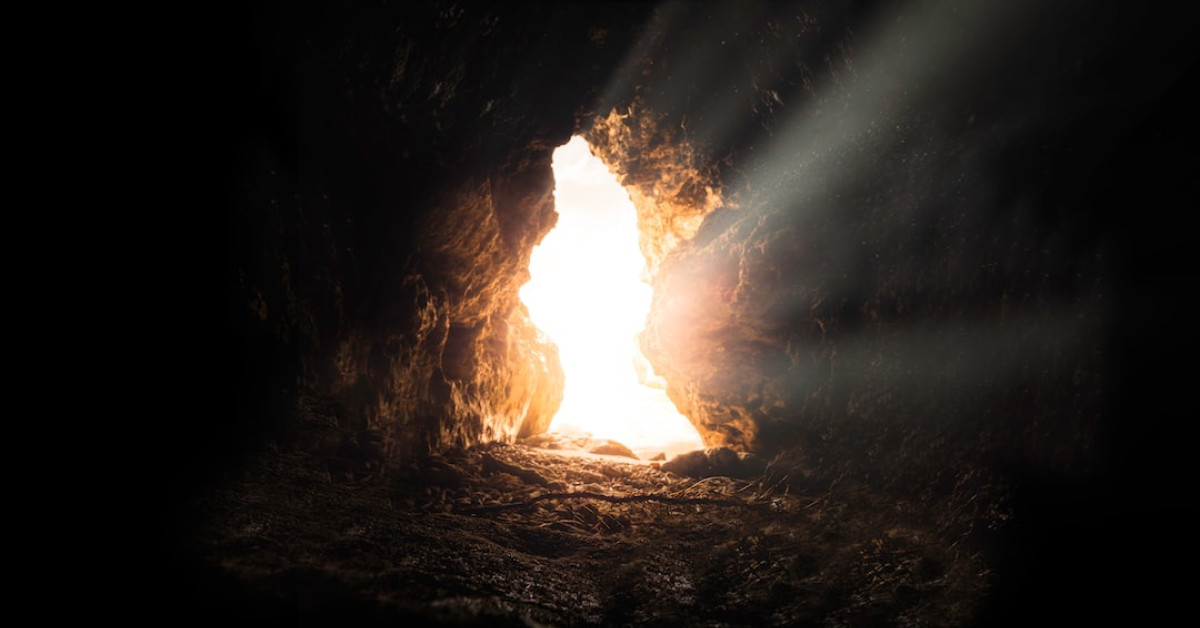 Expert cave diver exploring underwater cave system