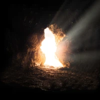 Expert cave diver exploring underwater cave system Expert cave diver exploring underwater cave system