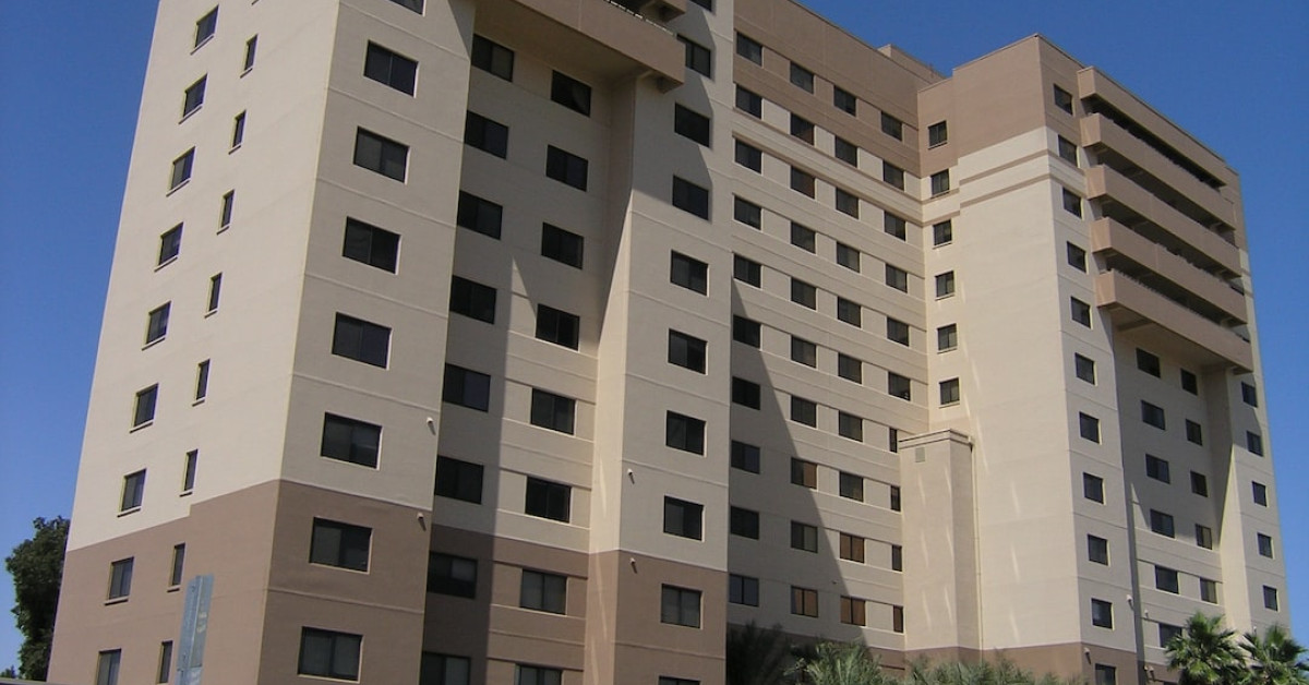 Key entering lock at Otay Mesa Enrollment Financial Center.