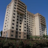 Key entering lock at Otay Mesa Enrollment Financial Center. Key entering lock at Otay Mesa Enrollment Financial Center.
