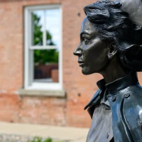 Novice chef opens cookbook for home cooking success tips. Novice chef opens cookbook for home cooking success tips.