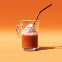 Starbucks coffee-infused smoothies on a wooden table. Starbucks coffee-infused smoothies on a wooden table.