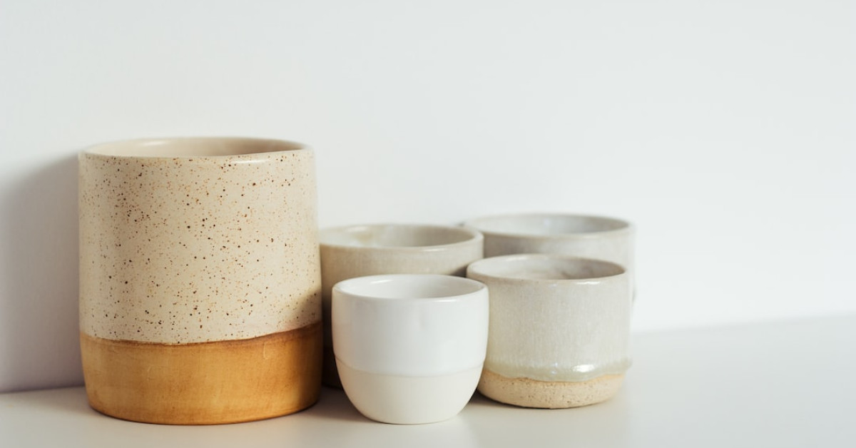 Rustic barrel bowls display culinary elegance on wooden table.