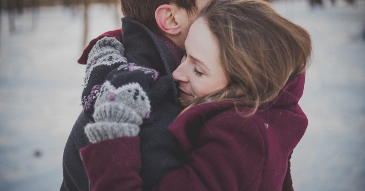 Sam Caird with spouse Anna Popplewell at an event.
