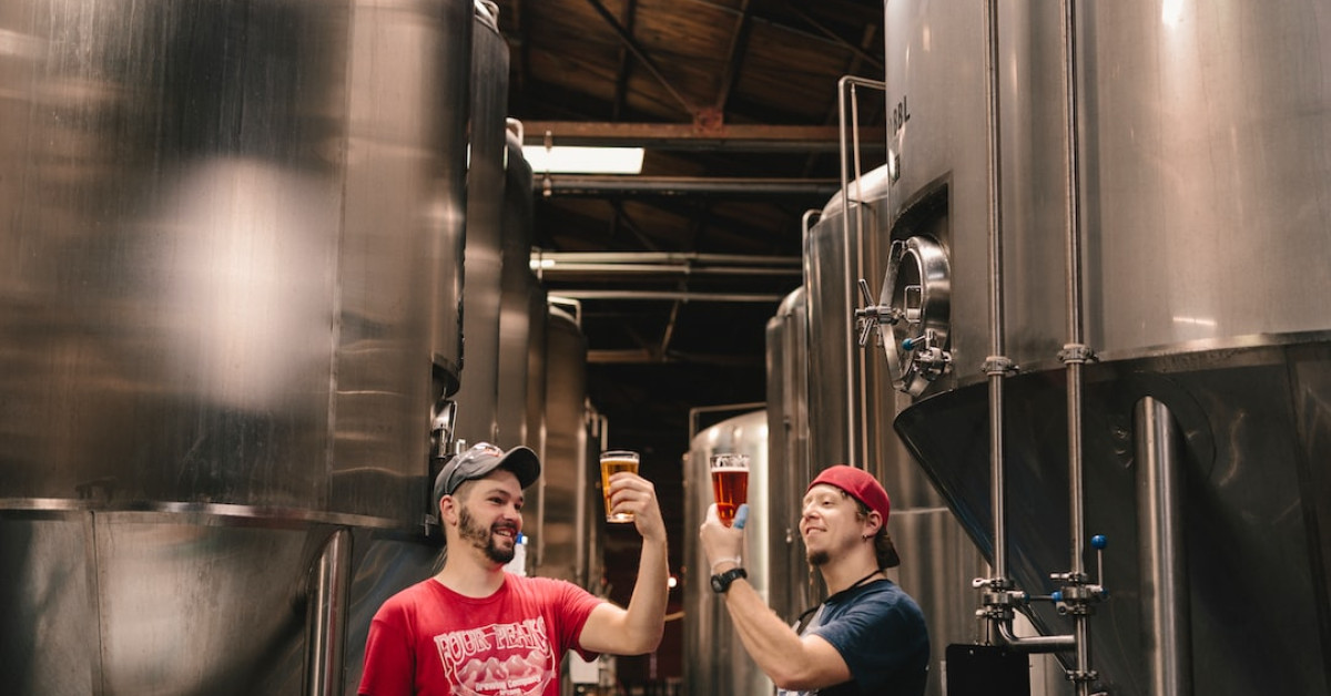 Madison Beer posing confidently, spotlight on rising music stardom.