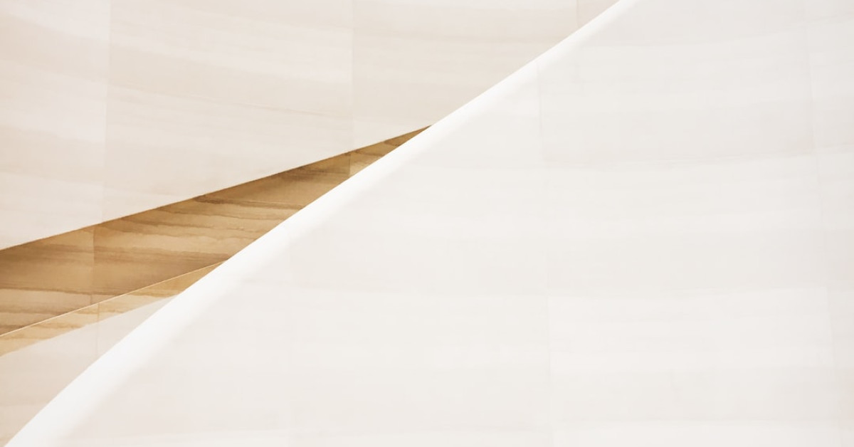 Orchard Oriole perched on a branch, exhibiting vibrant plumage.